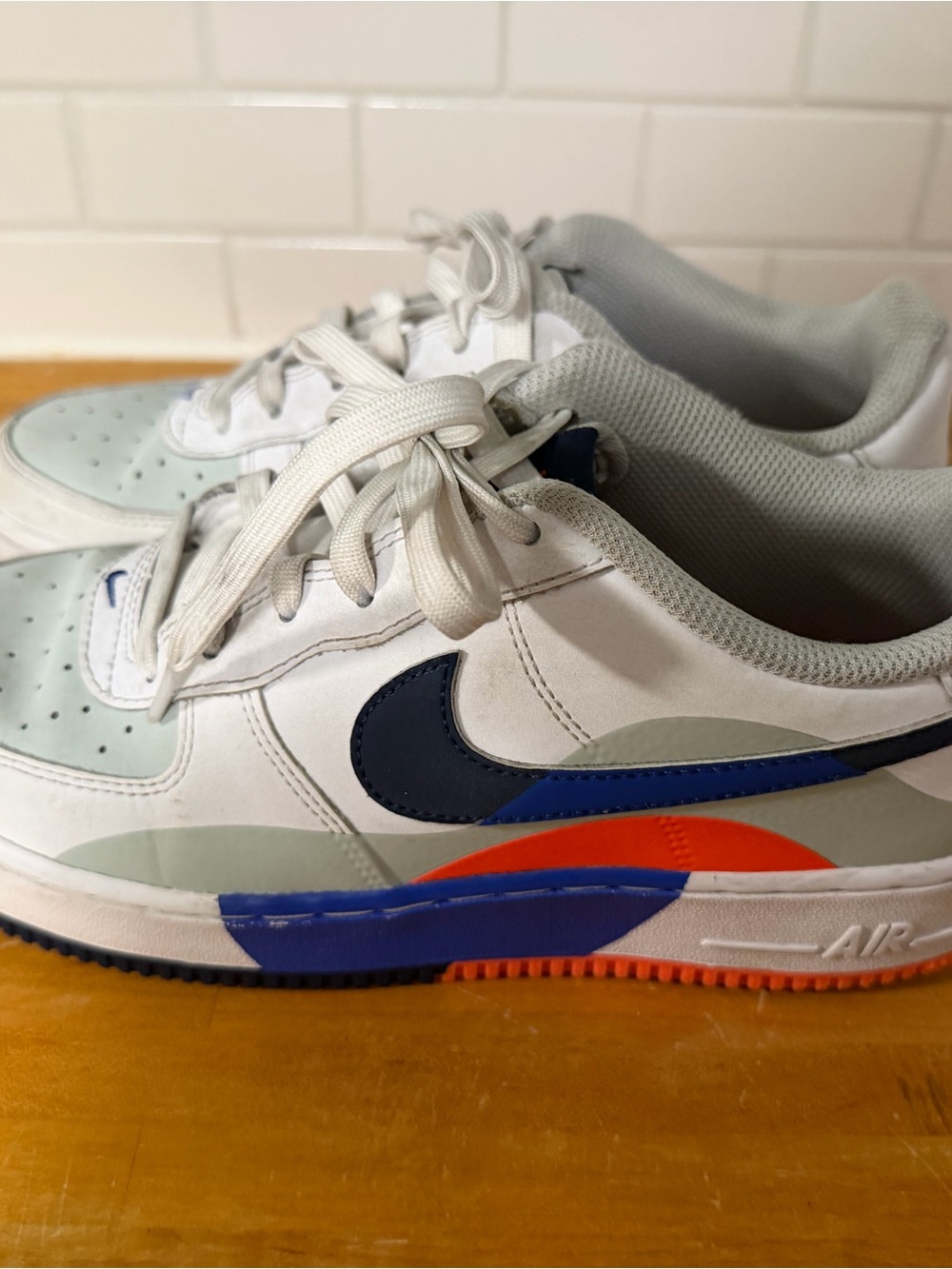 Nike Sneakers with Orange & Blue Accent